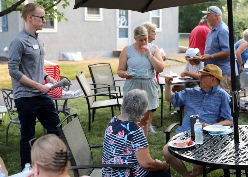 Sean Hayford Oleary speaking with residents at National Night Out 2021